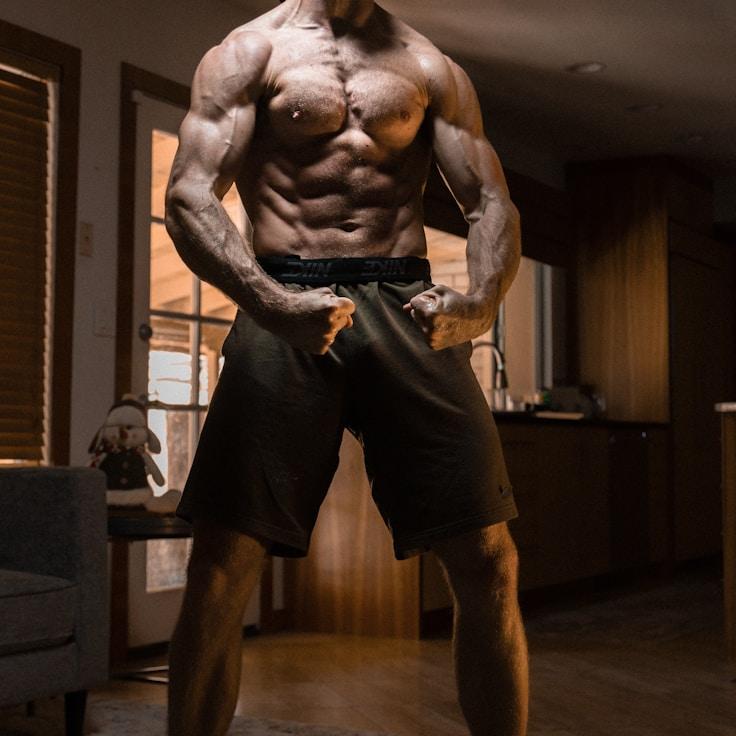 Interior of a professional gym with weight training equipment and mirrors